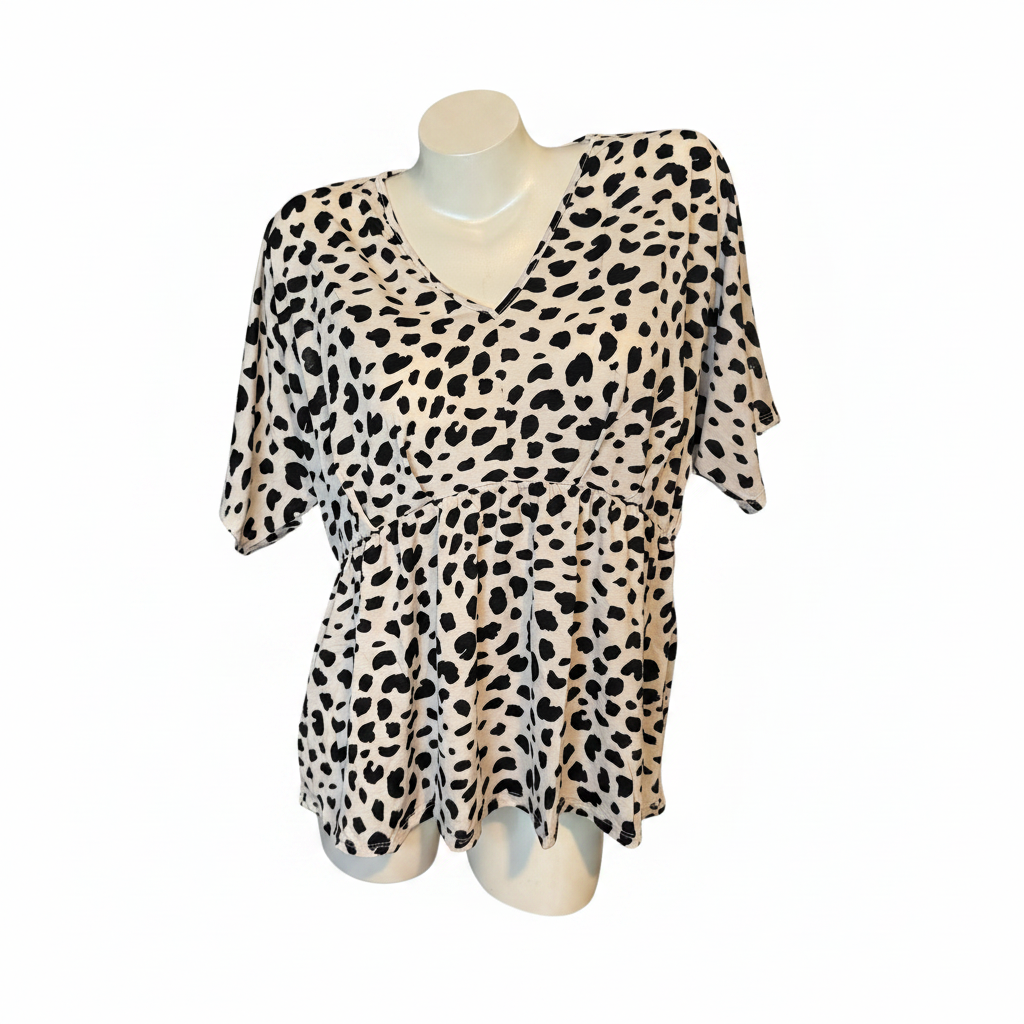 L.I.A Peplum spotted top